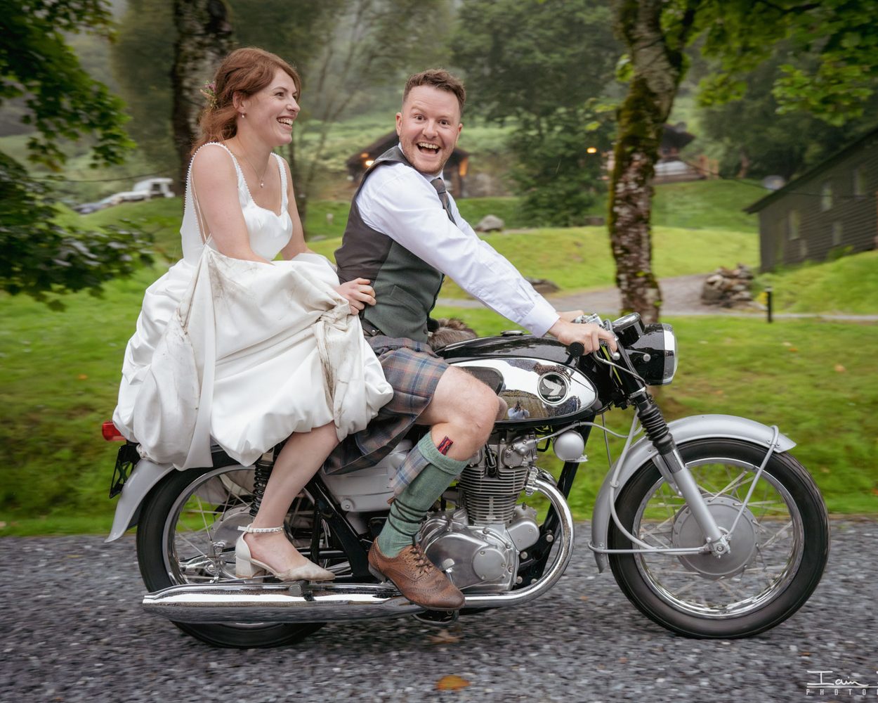 A relaxed, candid moment between a bride and groom in a garden